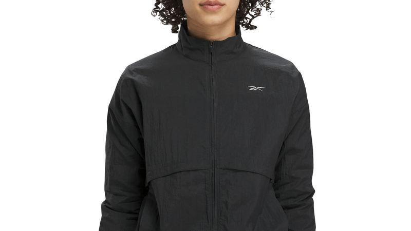 Campera Rompevientos Reebok Mujer Running Woven Negra Sportotal